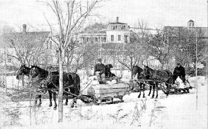 Hauling goods with horses on Flat Iron Rd., 1910.